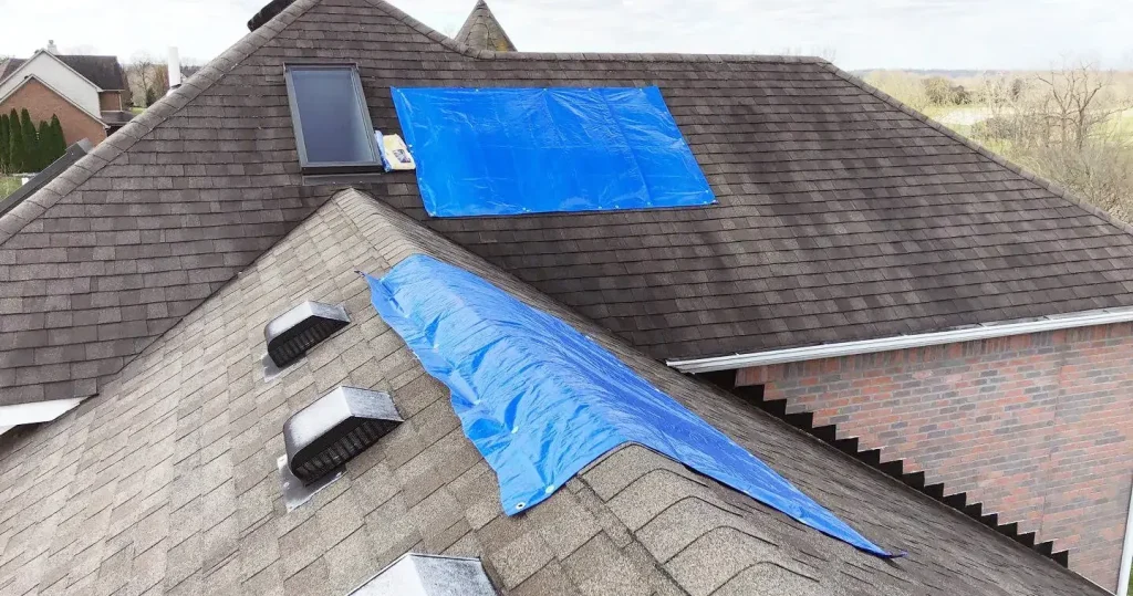 roof repairs tarped roof.jpg 1