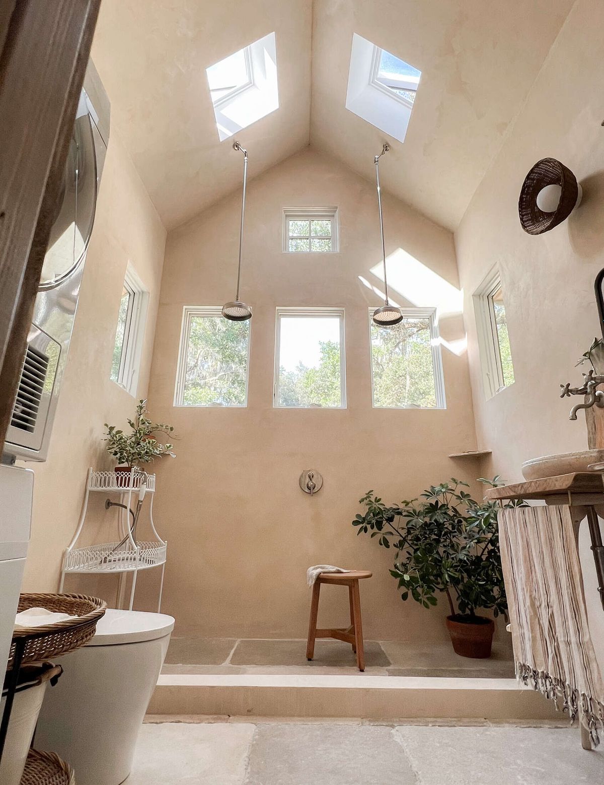 Bright bathroom with VELUX skylights and shades