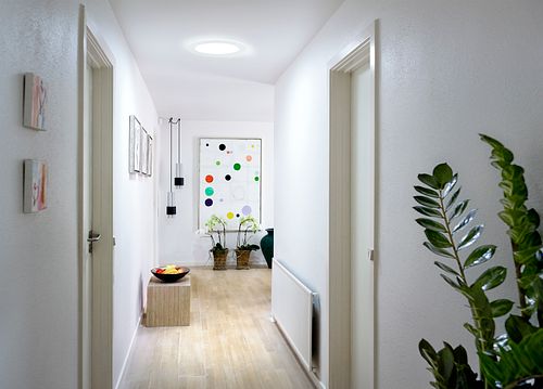 Hallway lit by a VELUX Sun Tunnel skylight